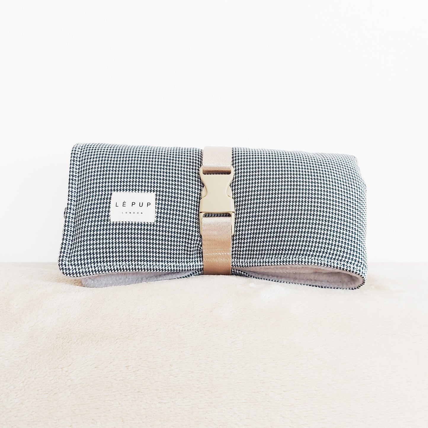 Front view of handmade dog travel mat rolled up. Perfect for travelling by LE PUP.