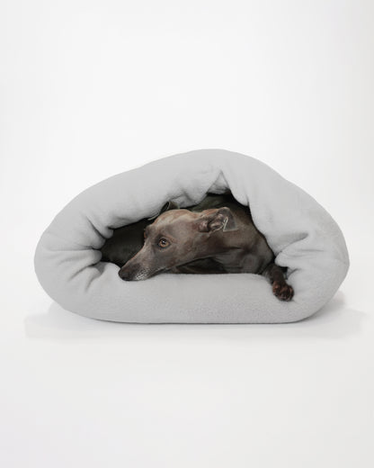 Dog sleeping in pet cave looking snuggly and cosy handmade by LE PUP.