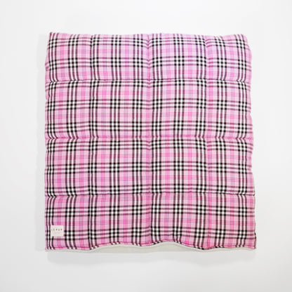 Top view of showing quilted snuggle sack in pink tartan for small breed by LE PUP.