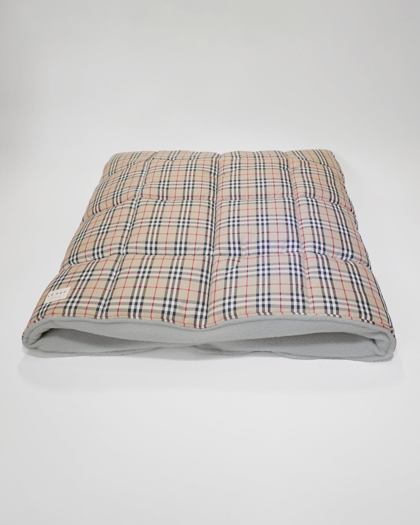 British classic tartan quilted dog travel bed laid flat handmade by LE PUP.