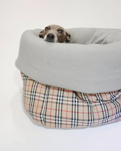 Cute Italian greyhound peeping from portable dog snuggle sack in tartan fabric, perfect as a dog car bed by LE PUP.